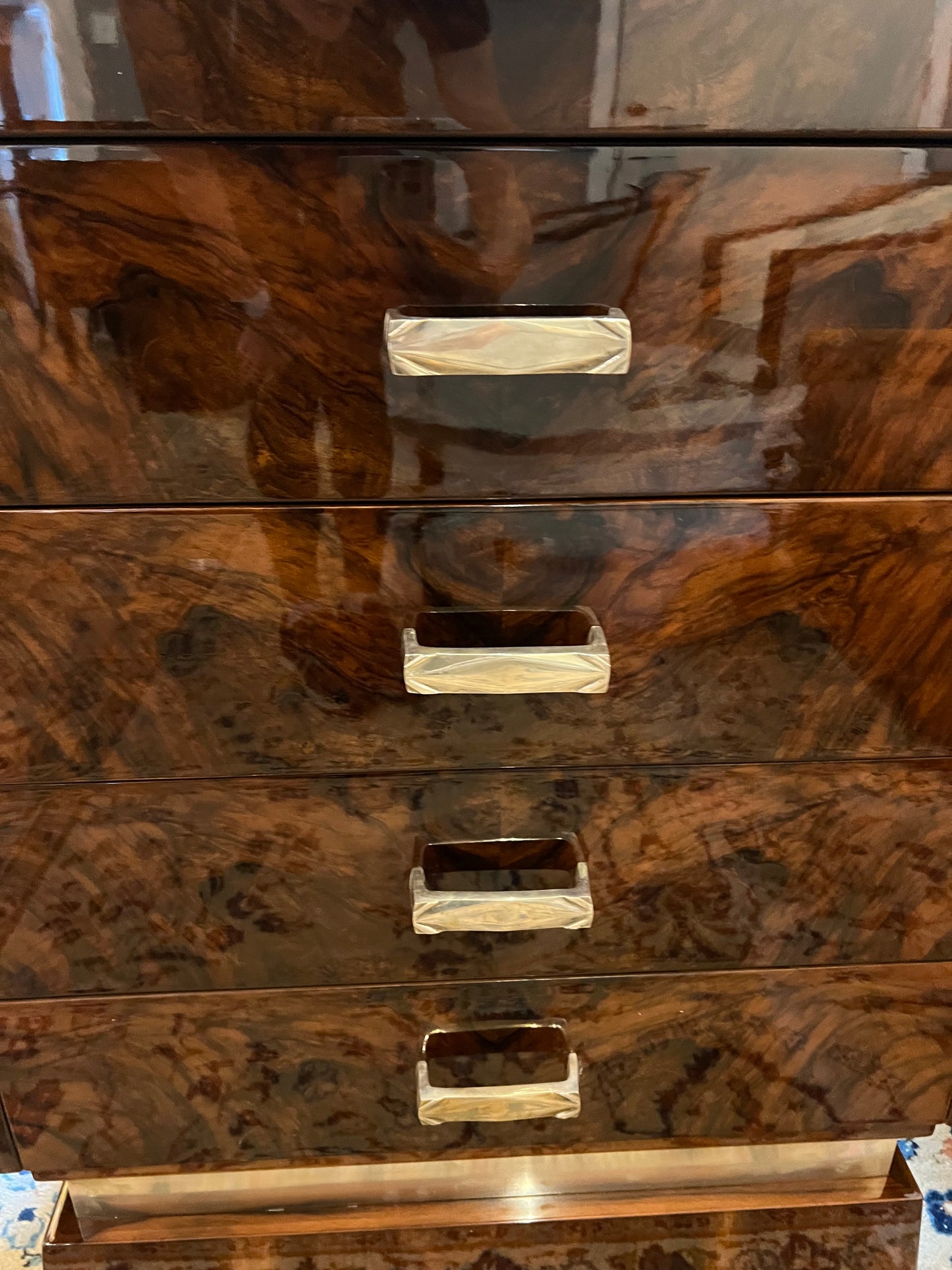 French Art Deco chest of drawers in walnut with brass handles
