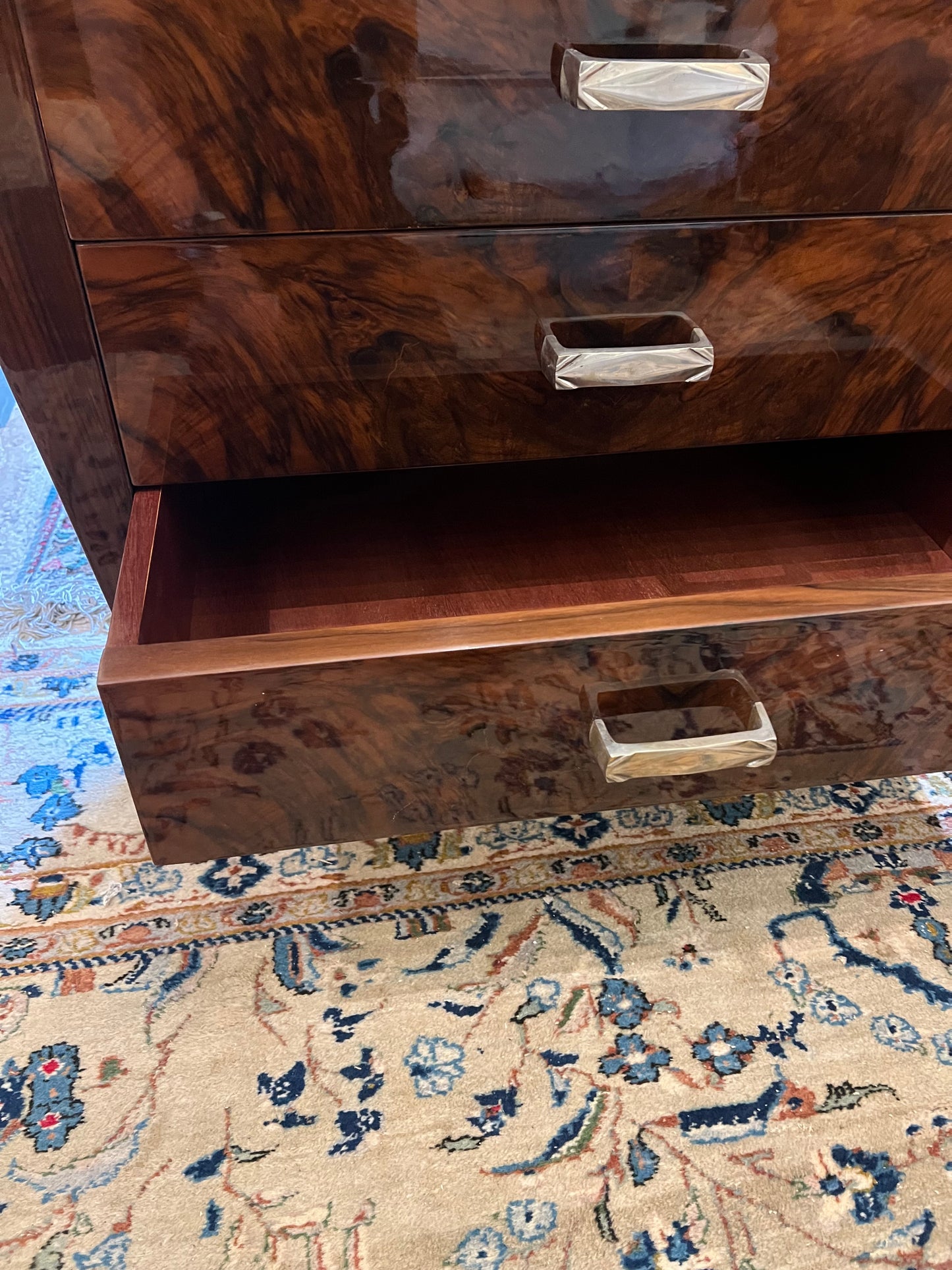 French Art Deco chest of drawers in walnut with brass handles